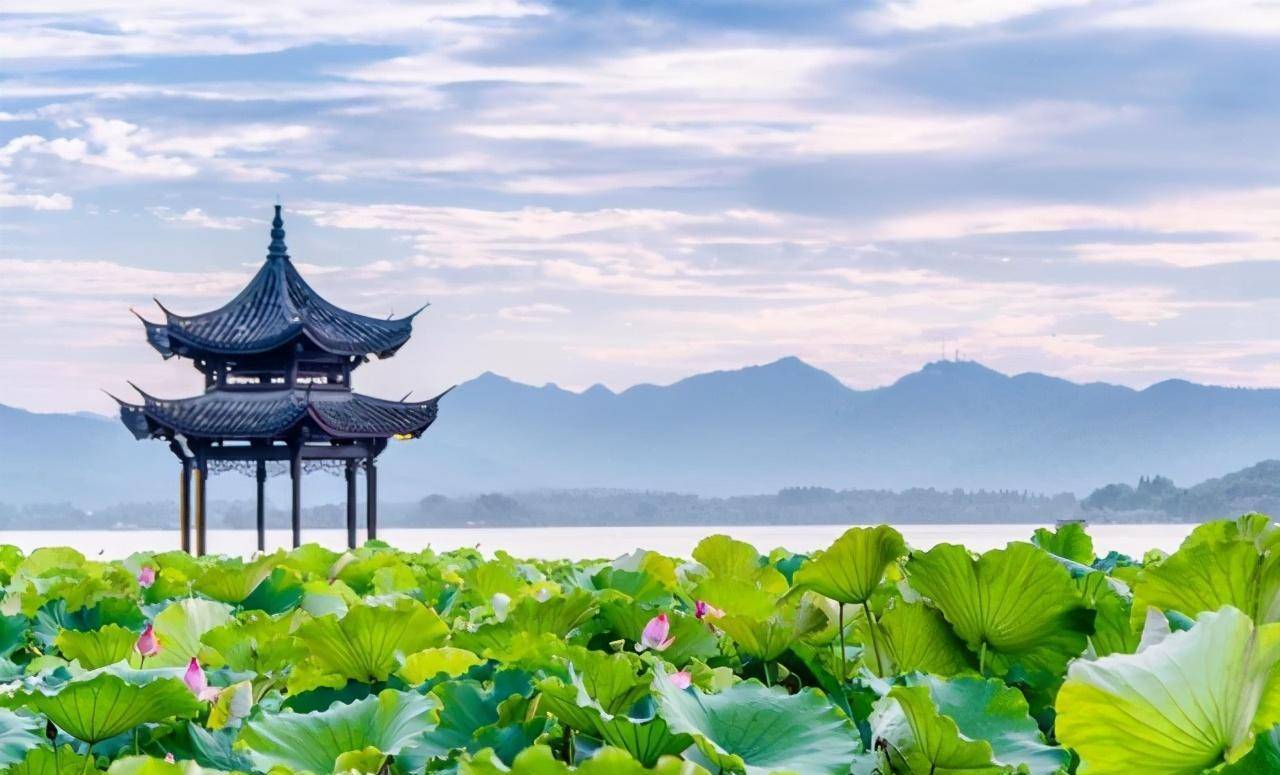 A lakeside Chinese city under soft light